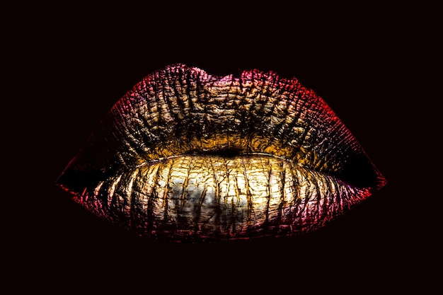 Foto labios femeninos metalizados dorados sexy