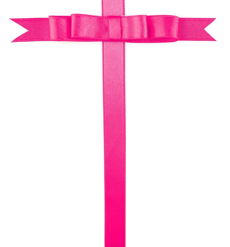 Foto laço de fita rosa isolado no branco