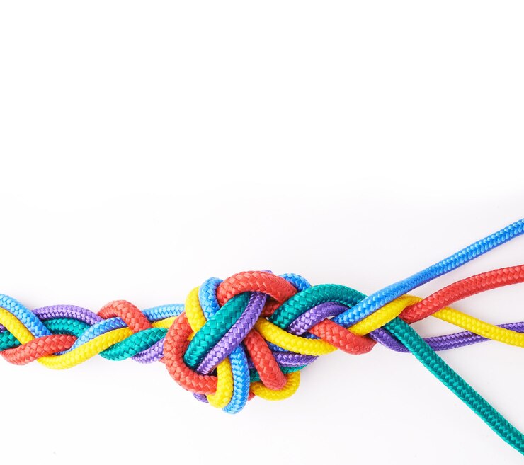Foto laços de corda e unidade de cor em nó ou trança em fundo branco em estúdio para solidariedade cordão de segurança e conexão abstrata da sociedade arco-íris com laços juntos em colaboração com a comunidade