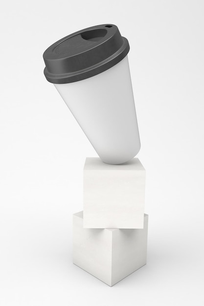 Lado derecho de la taza de café equilibrada en fondo blanco.