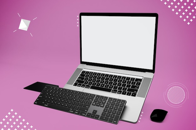 Lado direito abstrato do laptop pro no fundo rosa