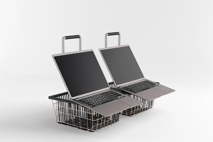 Foto lado de la perspectiva de la cesta de la compra y las computadoras portátiles de adha
