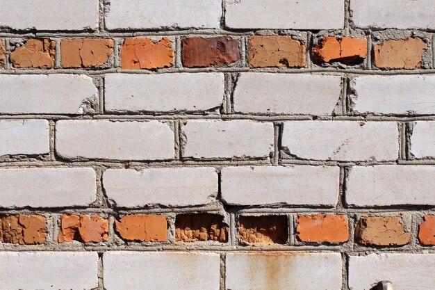 Ladrillo de textura Se puede utilizar como una pared de ladrillo de fondo fondo blanco y naranja