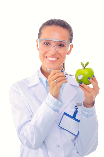 Lächelnde Frau Arzt mit einem grünen Apfel Frau Arzt