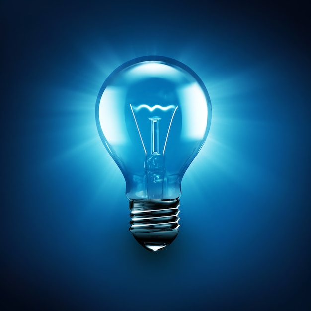 Foto lâmpada incandescente em um fundo azul