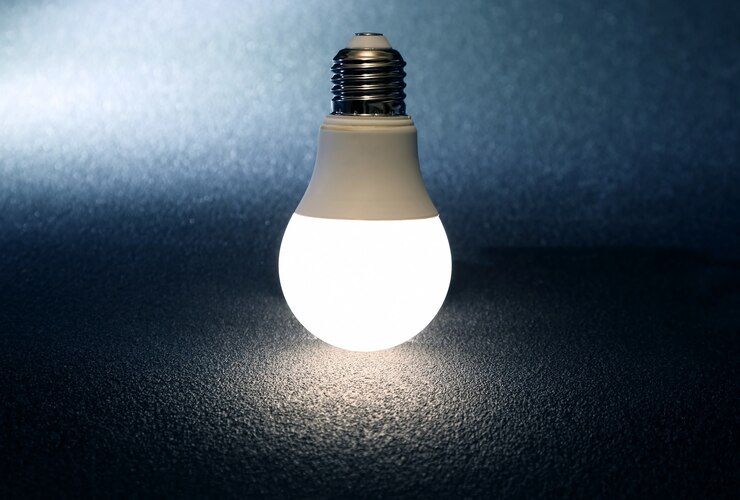 Foto lâmpada led incluída em superfície escura