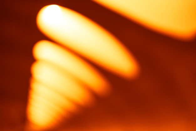 Foto lâmpadas de escritório laranja diagonal bokeh fundo hd