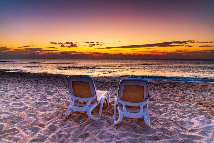 Foto landschaftliche aussicht auf den strand gegen den himmel beim sonnenuntergang