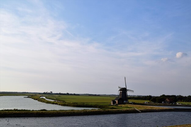 Foto landschaftsansicht eines ackerfeldes vor dem himmel