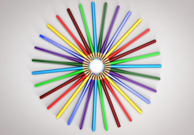 Lápices de colores repartidos en un círculo. Todos los colores del arcoiris.