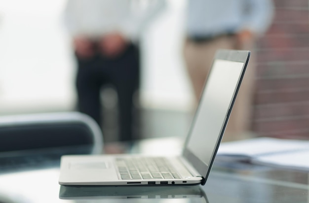 Laptop de fundo de negócios no escritório Deskphoto com espaço de cópia