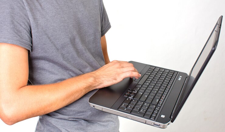 Foto laptop en mano