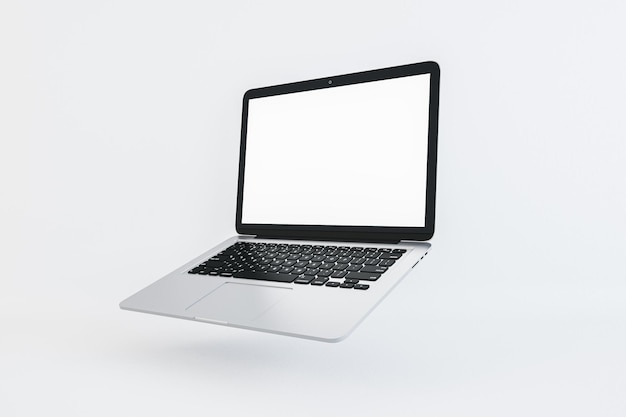Laptop plateado con pantalla en blanco sobre fondo blanco espacio de trabajo y concepto de tecnología Renderización 3D