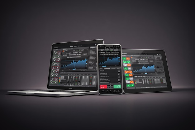 Laptop smartphone ant tablet pc con gráficos y diagramas de aplicación de comerciante de acciones en pantalla sobre fondo negro Concepto de mercado de bolsa