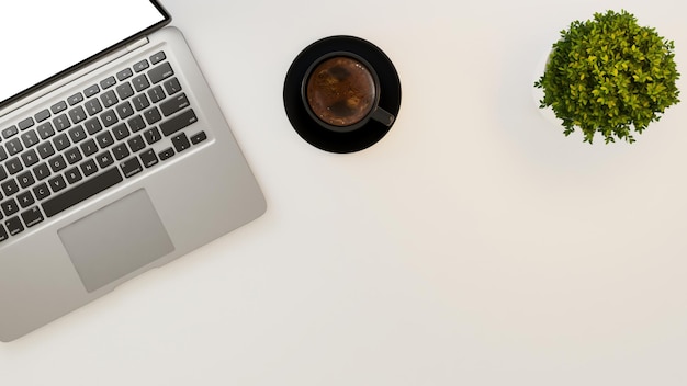 Laptop und schwarze Kaffeetasse und kleine Pflanze auf weißem Schreibtischhintergrund 3D-Rendering