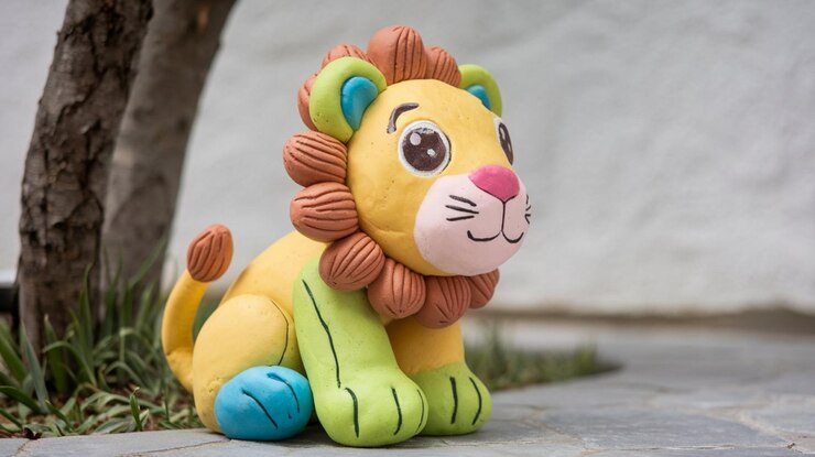 Leão feito de plasticina modelagem de barro brinquedo crianças crianças divertido conceito amplificador animal personagem bonito