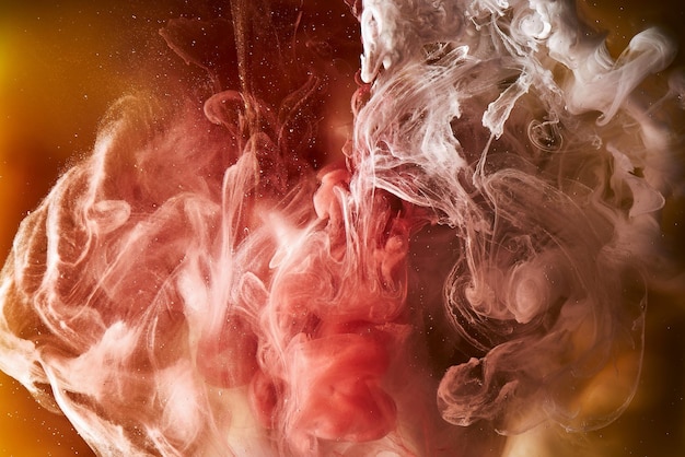 Lebendige Farben des Weltraums Ozeanmuster abstrakter Hintergrund Mischen von Farbe und flüssigem Rauch bunte Spritzer und Strudel von Tropfen unter Wasser mystische Kulisse