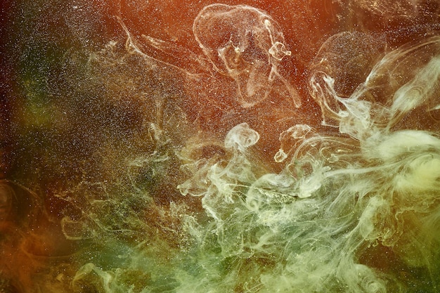 Lebendige Farben des Weltraums Ozeanmuster abstrakter Hintergrund Mischen von Farbe und flüssigem Rauch bunte Spritzer und Strudel von Tropfen unter Wasser mystische Kulisse