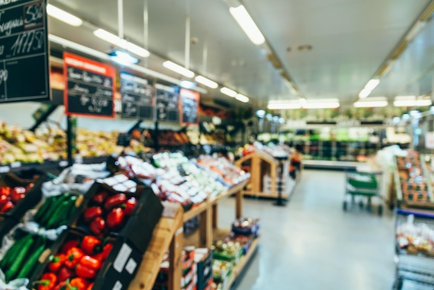 Foto lebensmittelgeschäft gemüse und obst im laden verschwommen unscharf