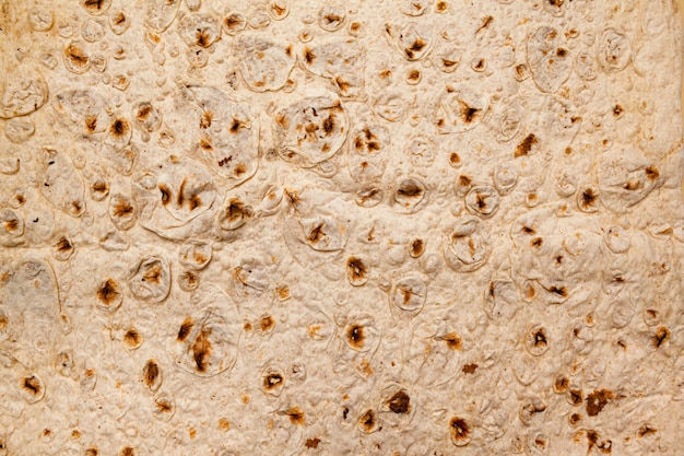 Lebensmittelhintergrund - Nahaufnahme von dünnem Lavash aus Weizenmehl