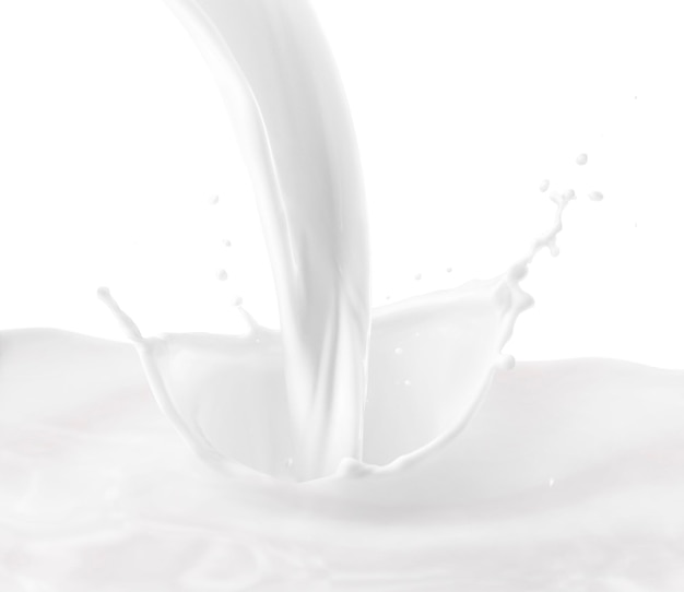 Leche salpicada sobre un fondo blanco
