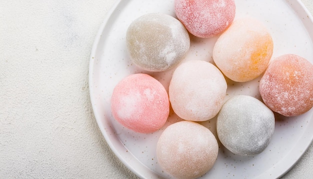 Leckeres Mochi auf dem Teller Traditionelles japanisches Dessert Reiskuchen Süßes und leckeres Essen Flachlag