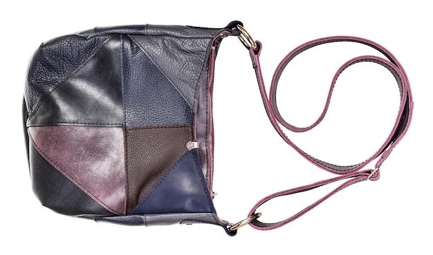 Foto ledertasche mit patchwork-dekoration isoliert