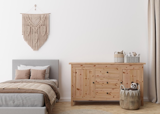 Leere weiße Wand im modernen Kinderzimmer Mock-up-Interieur im Boho-Stil Kopieren Sie Platz für Ihr Bild oder Poster Bettspielzeug Makramee-Wanddekoration Rattankorb Gemütliches Zimmer für Kinder 3D-Rendering