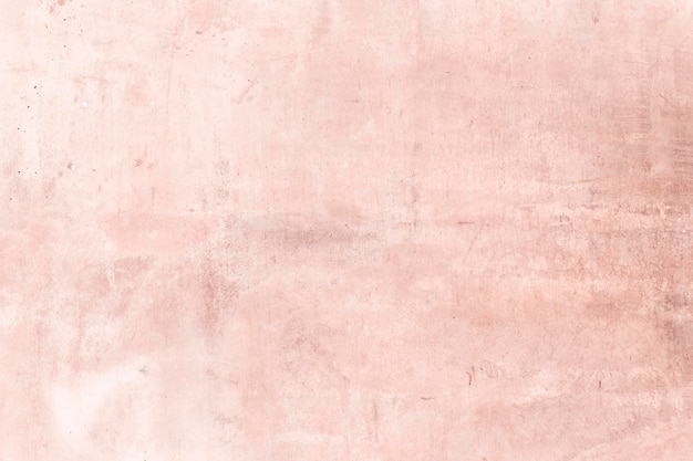 Leere zerkratzte rosa strukturierte Wand