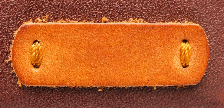 Foto leerer brauner leder-tag-etiketten-texturhintergrund