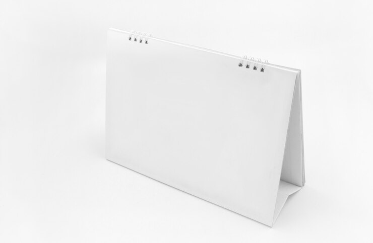 Foto leerer tischkalender auf weiß