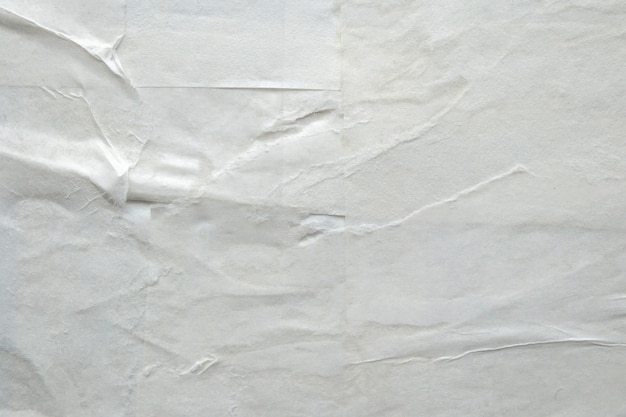 Leerer weißer zerrissener Papierplakatbeschaffenheitshintergrund
