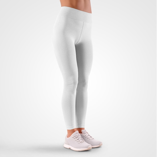 Leggings em uma garota de tênis sportswear calças femininas em um fundo isolado no estúdio