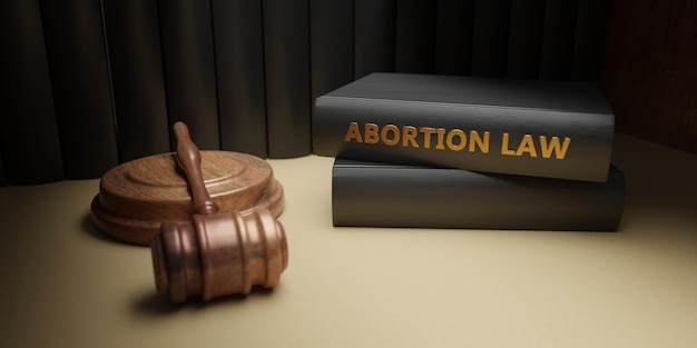 Foto lei de aborto terminação de gravidez legal ou ilegal juiz martelo sobre o livro de lei de aborto 3d render