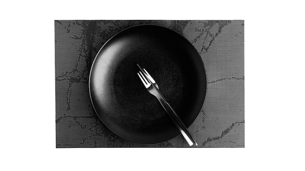 Lenguaje de señas con cubiertos. Un plato con cubiertos aislado sobre un fondo blanco. Plato, cuchillo, tenedor sobre un fondo blanco. Foto de alta calidad