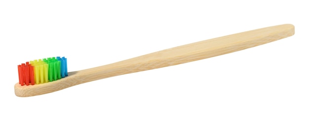 Lente de dientes de bambú sobre un fondo blanco aislado