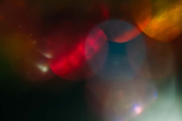 Lente flare colorido abstrato bokeh preto claro