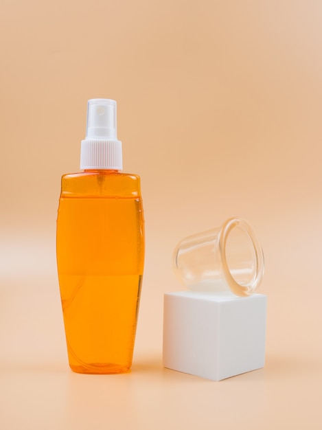 Óleo anticelulite e frasco de silicone para massagem a vácuo