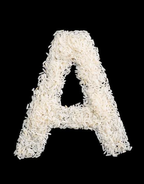 Letra del alfabeto de grano de arroz blanco