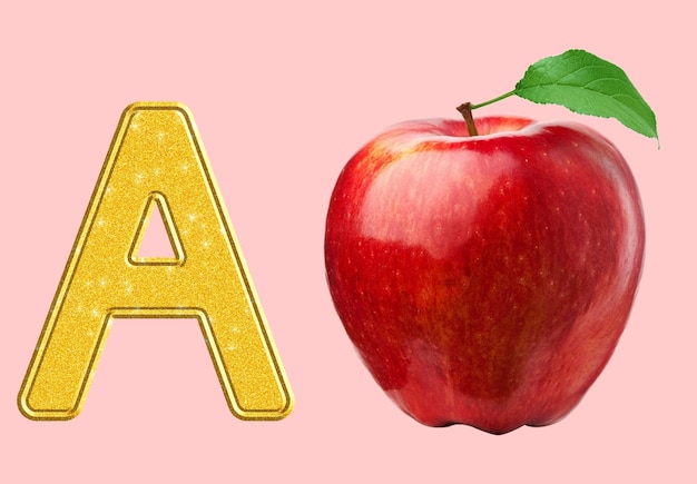 Letra A dorada con una manzana roja brillante sobre un fondo rosado