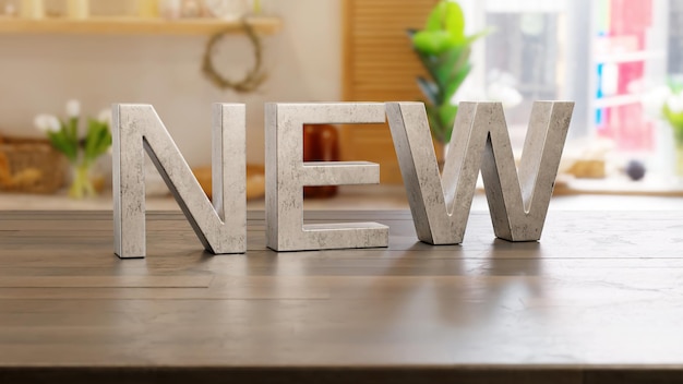 Letras de metal soletram novas em uma mesa de madeira na cozinha com reflexos de luz de janela