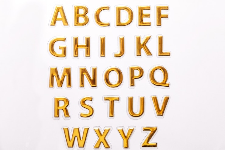 Foto letras douradas brilhantes isoladas em branco