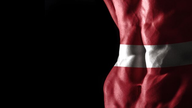 Lettland-Flagge auf Bauchmuskeln Nationalsporttraining, Bodybuilding-Konzept, schwarzer Hintergrund