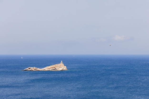 Leuchtturm Faro dello Scoglietto di Portoferraio mit zylindrischem Steinturm 8 m hoch, Elba Italien