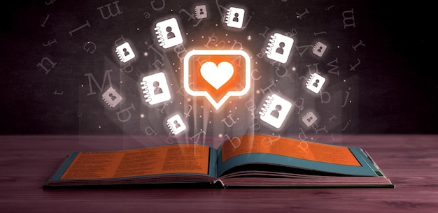 Libro abierto con iconos de redes sociales en la parte superior