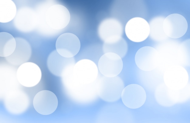 Lichter oder verschwommenes Bokeh auf blauem Gradienten-Hintergrund