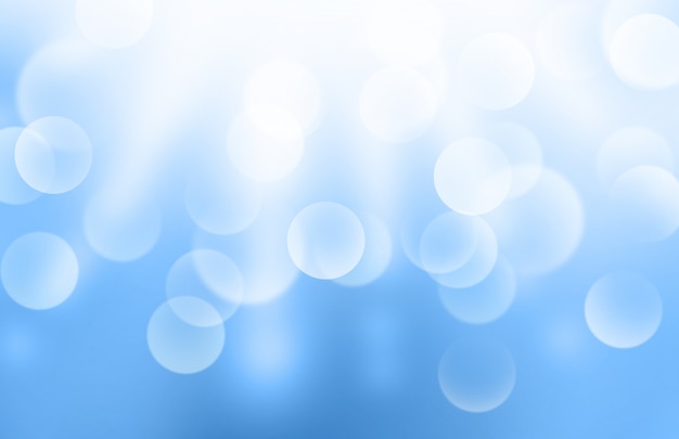 Lichter oder verschwommenes Bokeh auf blauem Gradienten-Hintergrund