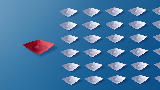 Foto liderança conceito origami vermelho barco de papel grupo líder de barcos brancos