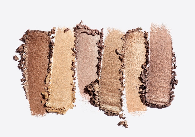 Foto lidschatten schimmernde matte mehrfarbige braune nude-palette textur hintergrund weiß isoliert