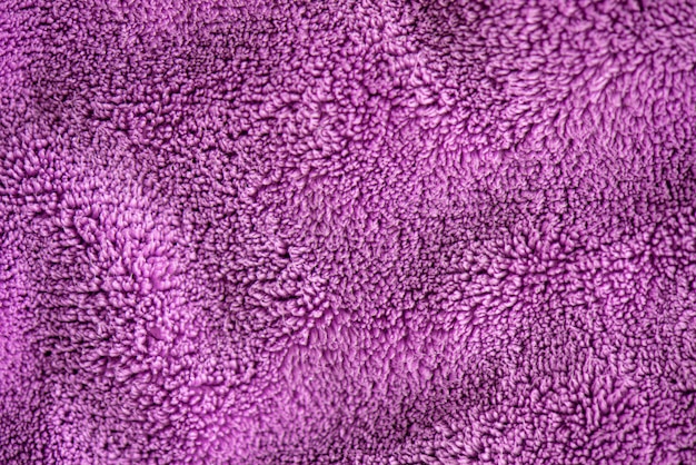 Lila delicada suave fondo de piel de felpa suave tejido. Textura de púrpura manta suave y suave textil